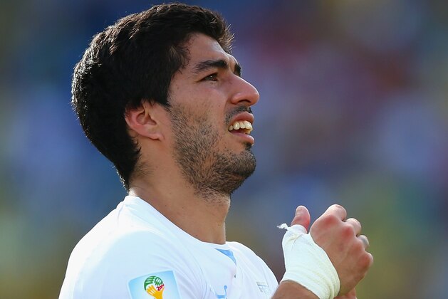 NATAL, BRAZIL - JUNE 24:  Luis Suarez of Uruguay acknowledges the fans after a 1-0 victory over Italy in the 2014 FIFA World Cup Brazil Group D match between Italy and Uruguay at Estadio das Dunas on June 24, 2014 in Natal, Brazil.  (Photo by Clive Rose/Getty Images)