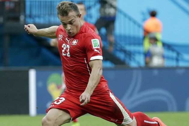 Switzerland's Xherdan Shaqiri scores his team's second goal during the group E World Cup soccer match between Honduras and Switzerland at the Arena da Amazonia in Manaus, Brazil, Wednesday, June 25, 2014. (AP Photo/Felipe Dana)