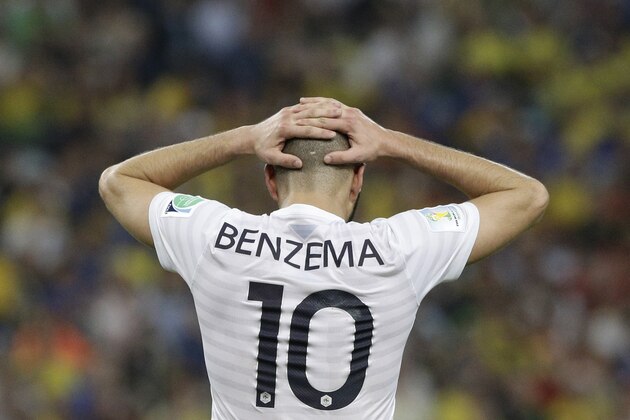 France's Karim Benzema puts his hands on his head during the group E World Cup soccer match between Ecuador and France at the Maracana Stadium in Rio de Janeiro, Brazil, Wednesday, June 25, 2014. (AP Photo/Christophe Ena)