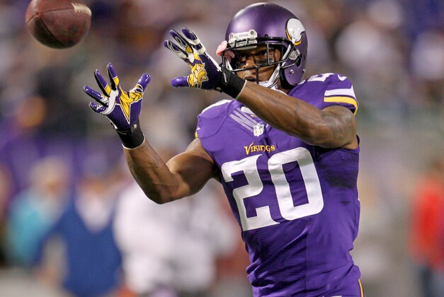 Oct 27, 2013; Minneapolis, MN, USA; Minnesota Vikings cornerback Chris Cook (20) warms up prior to the game against the Green Bay Packers at Mall of America Field at H.H.H. Metrodome. Mandatory Credit: Brace Hemmelgarn-USA TODAY Sports