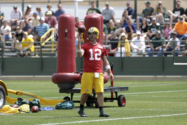 Green Bay Packers quarterback Aaron Rodgers during an NFL football mini camp practice Tuesday, June. 17, 2014, in Green Bay, Wis. (AP Photo/Mike Roemer)