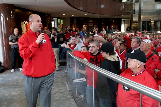 Georgia defensive coordinator Jeremy Pruitt answers questions from a crowd of fans about Georgia's recruiting class on national signing day Wednesday, Feb. 5, 2014, in Athens, Ga. (AP Photo/Jason Getz)