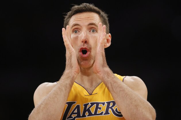 Los Angeles Lakers' Steve Nash communicates with teammate Pau Gasol, not pictured, against the Portland Trail Blazers during the first half of an NBA basketball game in Los Angeles, Tuesday, April 1, 2014. (AP Photo/Danny Moloshok) Los Angeles Lakers' Steve Nash communicates with teammate Pau Gasol, not pictured, against the Portland Trail Blazers during the first half of an NBA basketball game in Los Angeles, Tuesday, April 1, 2014. (AP Photo/Danny Moloshok)