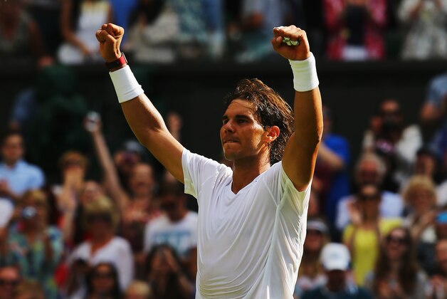 LONDON, ENGLAND - JUNE 24:  Rafael Nadal of Spain celebrates winning his Gentlemen's Singles first round match against Martin Klizan of Slovakia on day two of the Wimbledon Lawn Tennis Championships at the All England Lawn Tennis and Croquet Club at Wimbledon on June 24, 2014 in London, England.  (Photo by Al Bello/Getty Images)