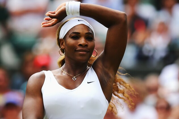 LONDON, ENGLAND - JUNE 26:  Serena Williams of the United celebrates after winning her Ladies' Singles second round match against Chanelle Scheepers of South Africa on day four of the Wimbledon Lawn Tennis Championships at the All England Lawn Tennis and Croquet Club at Wimbledon on June 26, 2014 in London, England.  (Photo by Al Bello/Getty Images)