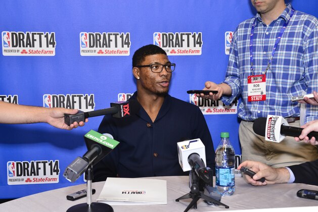 NEW YORK - JUNE 25: NBA Draft Prospect Marcus Smart, speaks to the media during media availability as part of the 2014 NBA Draft on June 25, 2014 at the Westin Times Square in New York City. NOTE TO USER: User expressly acknowledges and agrees that, by downloading and/or using this photograph, user is consenting to the terms and conditions of the Getty Images License Agreement. Mandatory Copyright Notice: Copyright 2013 NBAE (Photo by David Dow/NBAE via Getty Images) NEW YORK - JUNE 25: NBA Draft Prospect Marcus Smart, speaks to the media during media availability as part of the 2014 NBA Draft on June 25, 2014 at the Westin Times Square in New York City. NOTE TO USER: User expressly acknowledges and agrees that, by downloading and/or using this photograph, user is consenting to the terms and conditions of the Getty Images License Agreement. Mandatory Copyright Notice: Copyright 2013 NBAE (Photo by David Dow/NBAE via Getty Images)