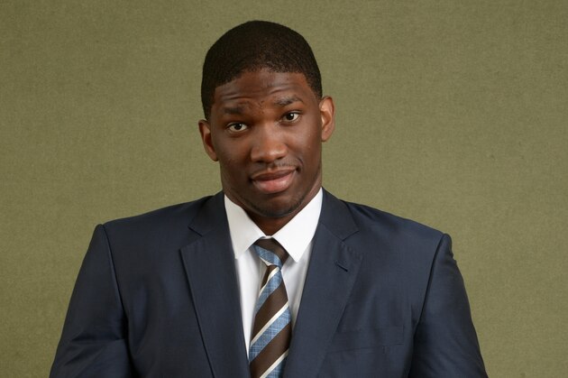 NEW YORK - MAY 20: NBA Draft prospect Joel Embiid poses for portraits with the Draft Caps prior to the 2013 NBA Draft Lottery on May 20, 2014 at the NBA Headquarters in New York City.  NOTE TO USER: User expressly acknowledges and agrees that, by downloading and/or using this photograph, user is consenting to the terms and conditions of the Getty Images License Agreement. Mandatory Copyright Notice: Copyright 2014 NBAE (Photo by Jennifer Pottheiser/NBAE via Getty Images)