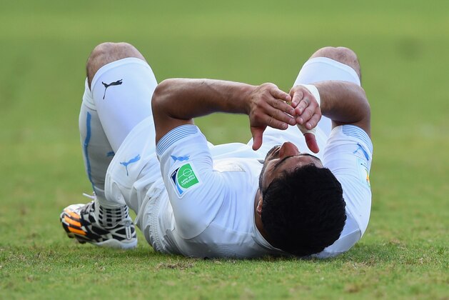NATAL, BRAZIL - JUNE 24:  Luis Suarez of Uruguay reacts during the 2014 FIFA World Cup Brazil Group D match between Italy and Uruguay at Estadio das Dunas on June 24, 2014 in Natal, Brazil.  (Photo by Matthias Hangst/Getty Images)