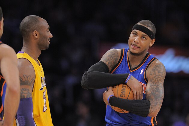 Los Angeles Lakers guard Kobe Bryant, left, and New York Knicks forward Carmelo Anthony prior to their NBA basketball game, Thursday, Dec. 29, 2011, in Los Angeles. The Lakers won 99-82.  (AP Photo/Mark J. Terrill)
