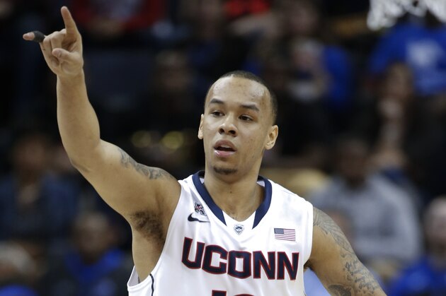 Connecticut guard Shabazz Napier celebrates a score against Memphis during the first half of an NCAA college basketball game in the quarterfinals of the American Athletic Conference men's tournament Thursday, March 13, 2014, in Memphis, Tenn. (AP Photo/Mark Humphrey)