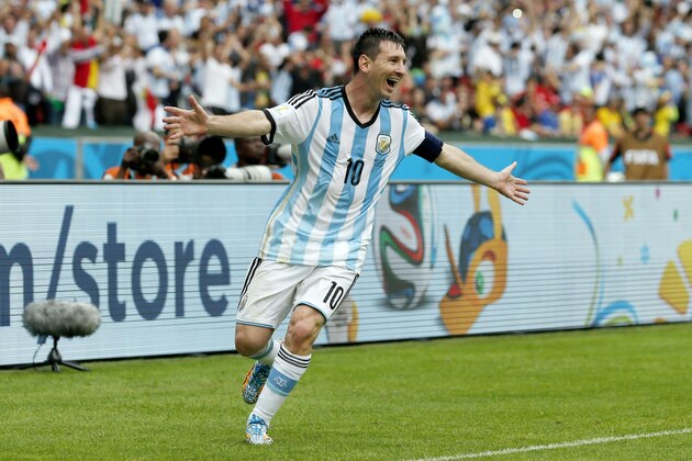 Argentina's Lionel Messi celebrates after scoring his side's second goal during the group F World Cup soccer match against Argentina at the Estadio Beira-Rio in Porto Alegre, Brazil, Wednesday, June 25, 2014. (AP Photo/Jon Super)