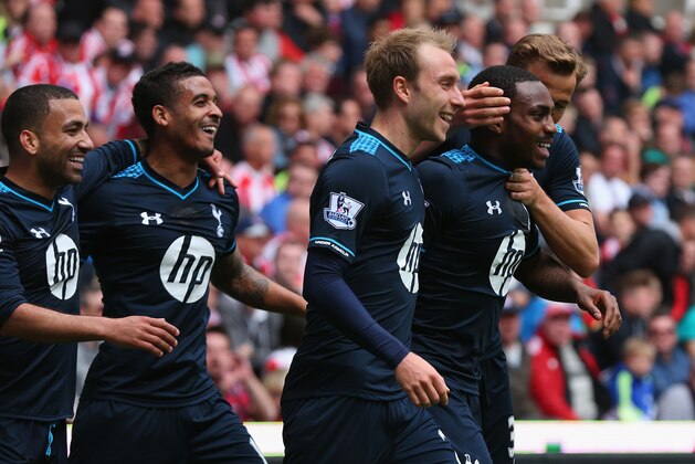 STOKE ON TRENT, ENGLAND - APRIL 26:  Danny Rose of Tottenham Hotspur celebrates with team mates after scoring the opening goal during the Barclays Premier League match between Stoke City and Tottenham Hotspur at the Britannia Stadium on April 26, 2014 in Stoke on Trent, England.  (Photo by Alex Livesey/Getty Images)