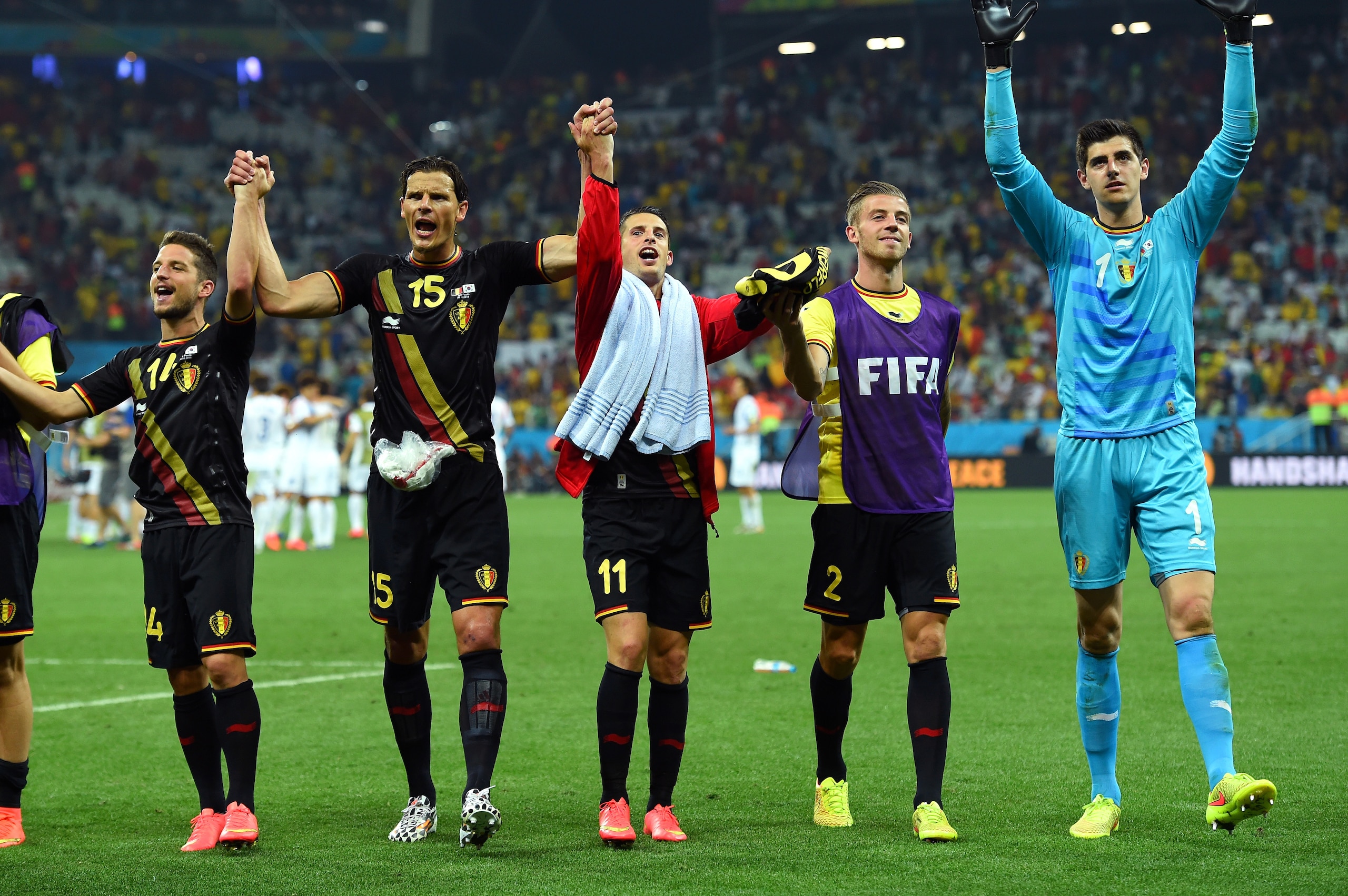 SAO PAULO, BRAZIL - JUNE 26:  Belgium players acknowledge the fans after defeating South Korea in the 2014 FIFA World Cup Brazil Group H match between South Korea and Belgium at Arena de Sao Paulo on June 26, 2014 in Sao Paulo, Brazil.  (Photo by Stu Forster/Getty Images)