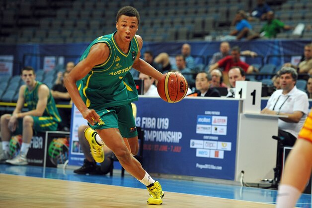 This June 29, 2013 photo provided by FIBA shows Australian basketball player Dante Exum during the FIBA U19 championship match against Brazil in Prague. Exum is a possible pick in the 2014 NBA Draft, Thursday, June 26, 2014 in New York.(AP Photo/FIBA)