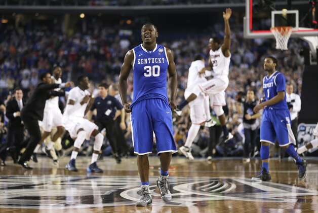Kentucky forward Julius Randle (30) walks off the court after his team's 60-54 loss to Connecticut in the NCAA Final Four tournament college basketball championship game Monday, April 7, 2014, in Arlington, Texas. (AP Photo/Charlie Neibergall)