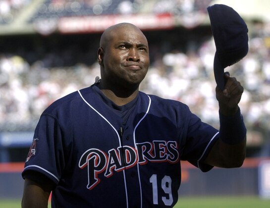 FILE - In this Oct. 7, 2001 file photo, San Diego Padres' Tony Gwynn fights back tears as he acknowledges the standing ovation prior to the Padres' game against the Colorado Rockies, the final game of his career, in San Diego.  The Baseball Hall of Fame said Gwynn died of cancer on Monday, June 16, 2014. He was 54. (AP Photo/Lenny Ignelzi, File)
