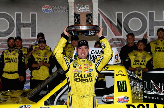 SPARTA, KY - JUNE 26:  Kyle Busch, driver of the #51 Dollar General Toyota, celebrates in victory lane after winning the NASCAR Camping World Series UNOH 225 at Kentucky Speedway on June 26, 2014 in Sparta, Kentucky.  (Photo by Sean Gardner/Getty Images)