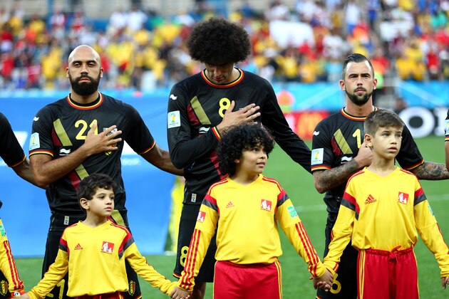 SAO PAULO, BRAZIL - JUNE 26:  (L-R) Anthony Vanden Borre, Marouane Fellaini and Steven Defour  of Belgium look on prior to the 2014 FIFA World Cup Brazil Group H match between South Korea and Belgium at Arena de Sao Paulo on June 26, 2014 in Sao Paulo, Brazil.  (Photo by Clive Brunskill/Getty Images)