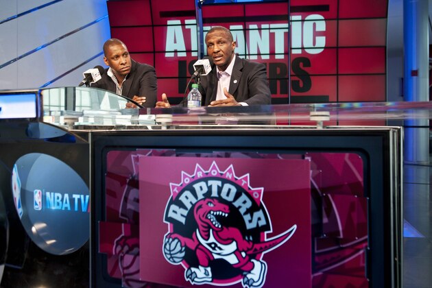Toronto Raptors president and general manager Masai Ujiri, left, and head coach Dwane Casey address the media during an NBA basketball news conference, Tuesday, May 6, 2014. Casey has agreed to a three-year contract extension after Toronto won a franchise-record 48 games this season. (AP Photo/The Canadian Press, Galit Rodan)