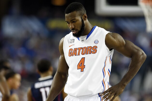 Apr 5, 2014; Arlington, TX, USA; Florida Gators center Patric Young (4) reacts in the second half against the Connecticut Huskies during the semifinals of the Final Four in the 2014 NCAA Mens Division I Championship tournament at AT&T Stadium. Mandatory Credit: Bob Donnan-USA TODAY Sports