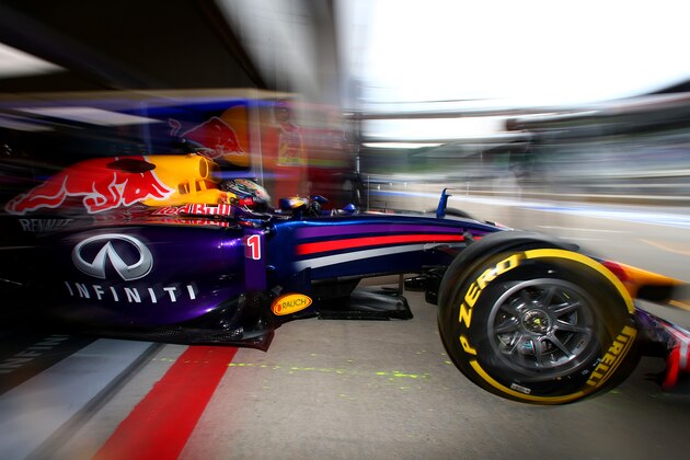 SPIELBERG, AUSTRIA - JUNE 20:  Sebastian Vettel of Germany and Infiniti Red Bull Racing exits the garage during practice ahead of the Austrian Formula One Grand Prix at Red Bull Ring on June 20, 2014 in Spielberg, Austria.  (Photo by Mark Thompson/Getty Images)