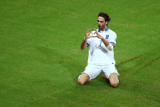 FORTALEZA, BRAZIL - JUNE 24:  Giorgos Samaras of Greece celebrates scoring his team's second goal on a penalty kick during the 2014 FIFA World Cup Brazil Group C match between Greece and the Ivory Coast at Castelao on June 24, 2014 in Fortaleza, Brazil.  (Photo by Robert Cianflone/Getty Images)
