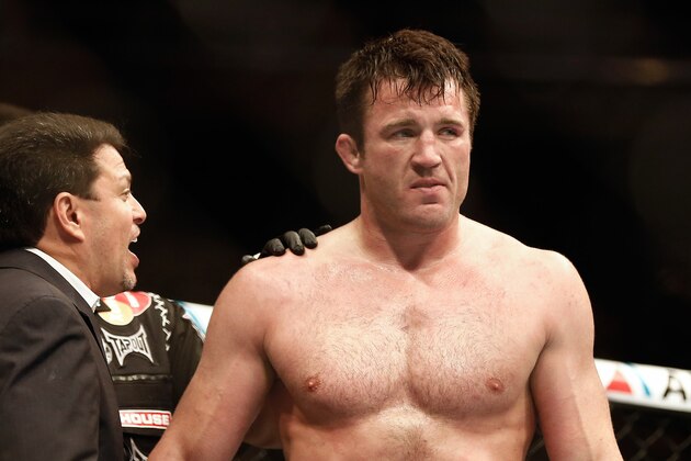 Aug 17, 2013; Boston, MA, USA; Chael Sonnen is congratulated after defeating Shogun Rua during a UFC Light Heavyweight match at the TD Garden.  Sonnen won in one round by a knockout. Mandatory Credit: Winslow Townson-USA TODAY Sports