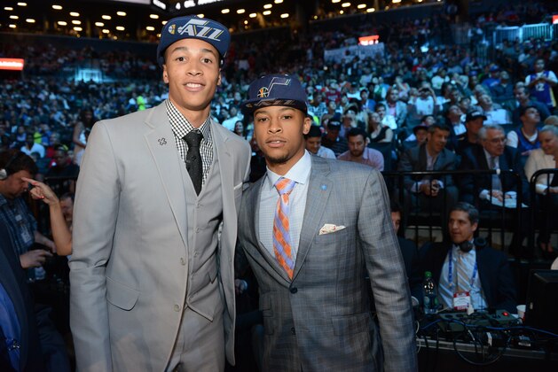 BROOKLYN, NY - JUNE 26: Dante Exum poses with Trey Burke of the Utah Jazz after being selected number five overall by the Utah Jazz during the 2014 NBA Draft on June 26, 2014 at Barclays Center in Brooklyn, New York. NOTE TO USER: User expressly acknowledges and agrees that, by downloading and or using this photograph, User is consenting to the terms and conditions of the Getty Images License Agreement. Mandatory Copyright Notice: Copyright 2014 NBAE (Photo by Jesse. D. Garrabrant/NBAE via Getty Images)