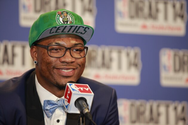 NEW YORK - JUNE 26: Marcus Smart addresses the media after being selected 6th overall by the Boston Celtics during the 2014 NBA Draft on June 26, 2014 at the Barclays Center in Brooklyn, New York. NOTE TO USER: User expressly acknowledges and agrees that, by downloading and/or using this photograph, user is consenting to the terms and conditions of the Getty Images License Agreement.  Mandatory Copyright Notice: Copyright 2014 NBAE (Photo by Jeyhoun Allebaugh/NBAE via Getty Images)