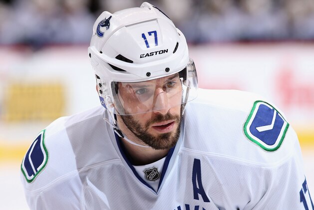 GLENDALE, AZ - MARCH 04:  Ryan Kesler #17 of the Vancouver Canucks awaits a face off against the Phoenix Coyotes during the third period of the NHL game at Jobing.com Arena on March 4, 2014 in Glendale, Arizona. The Coyotes defeated the Canucks 1-0.  (Photo by Christian Petersen/Getty Images)