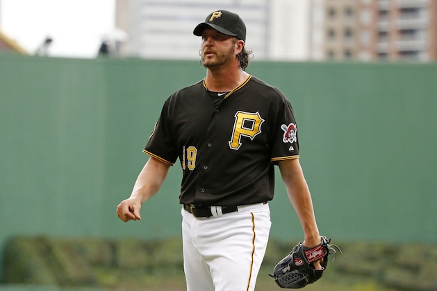 Pittsburgh Pirates relief pitcher Jason Grilli walks to the dugout after giving up a solo home run to Cincinnati Reds' Devin Mesoraco during the ninth inning of a baseball game in Pittsburgh Thursday, June 19, 2014. The Pirates won in 12 innings, 4-3. (AP Photo/Gene J. Puskar)