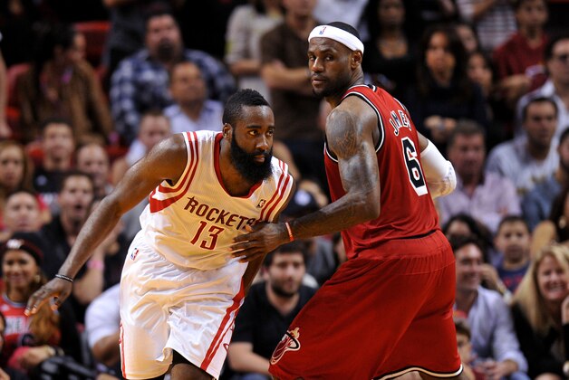 Feb 6 2013; Miami, FL, USA; Houston Rockets shooting guard James Harden (13) and Miami Heat small forward LeBron James (6) during the second half at American Airlines Arena. The Heat won 114-108. Mandatory Credit: Steve Mitchell-USA TODAY Sports