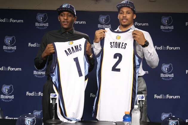 MEMPHIS, TN - JUNE 27: Jordan Adams, #1, and Jarnell Stokes, #2, of the Memphis Grizzlies are introduced by Chris Wallace and Dave Joerger during an introductory press conference for the Memphis Grizzlies draft selections on June 26, 2014 at the FedExForum in Memphis, Tennessee. NOTE TO USER: User expressly acknowledges and agrees that, by downloading and/or using this Photograph, user is consenting to the terms and conditions of the Getty Images License Agreement. Mandatory Copyright Notice: Copyright 2014 NBAE (Photo by Mike Brown/NBAE via Getty Images)