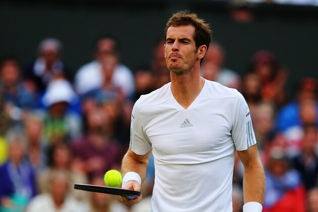 LONDON, ENGLAND - JUNE 27:  Andy Murray of Great Britain during his Gentlemen's Singles third round match against Roberto Bautista Agut of Spain on day five of the Wimbledon Lawn Tennis Championships at the All England Lawn Tennis and Croquet Club on June 27, 2014 in London, England.  (Photo by Al Bello/Getty Images)