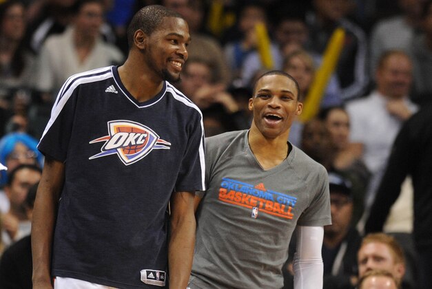 Jan 9, 2013; Oklahoma City, OK, USA; Oklahoma City Thunder forward Kevin Durant (35) and Thunder guard Russell  Westbrook (0) react to a play in action against the Minnesota Timberwolves during the second half at the Chesapeake Energy Arena.  Mandatory Credit: Mark D. Smith-USA TODAY Sports