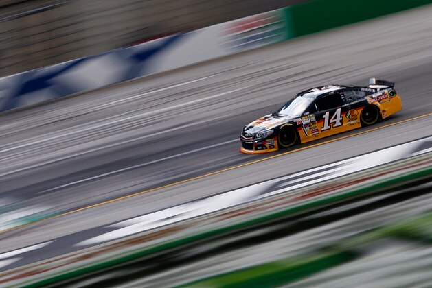 SPARTA, KY - JUNE 27: Tony Stewart, driver of the #14 Rush Truck Centers Chevrolet, qualifies for the NASCAR Sprint Cup Series Quaker State 400 presented by Advance Auto Parts at Kentucky Speedway on June 27, 2014 in Sparta, Kentucky. (Photo by Gregory Shamus/Getty Images) SPARTA, KY - JUNE 27: Tony Stewart, driver of the #14 Rush Truck Centers Chevrolet, qualifies for the NASCAR Sprint Cup Series Quaker State 400 presented by Advance Auto Parts at Kentucky Speedway on June 27, 2014 in Sparta, Kentucky. (Photo by Gregory Shamus/Getty Images)