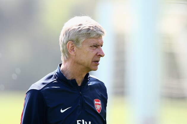 ST ALBANS, ENGLAND - MAY 14:  Arsene Wenger of Arsenal looks on during a training session ahead of the FA Cup Final match between Arsenal and Hull City at London Colney on May 14, 2014 in St Albans, England.  (Photo by Clive Mason/Getty Images)