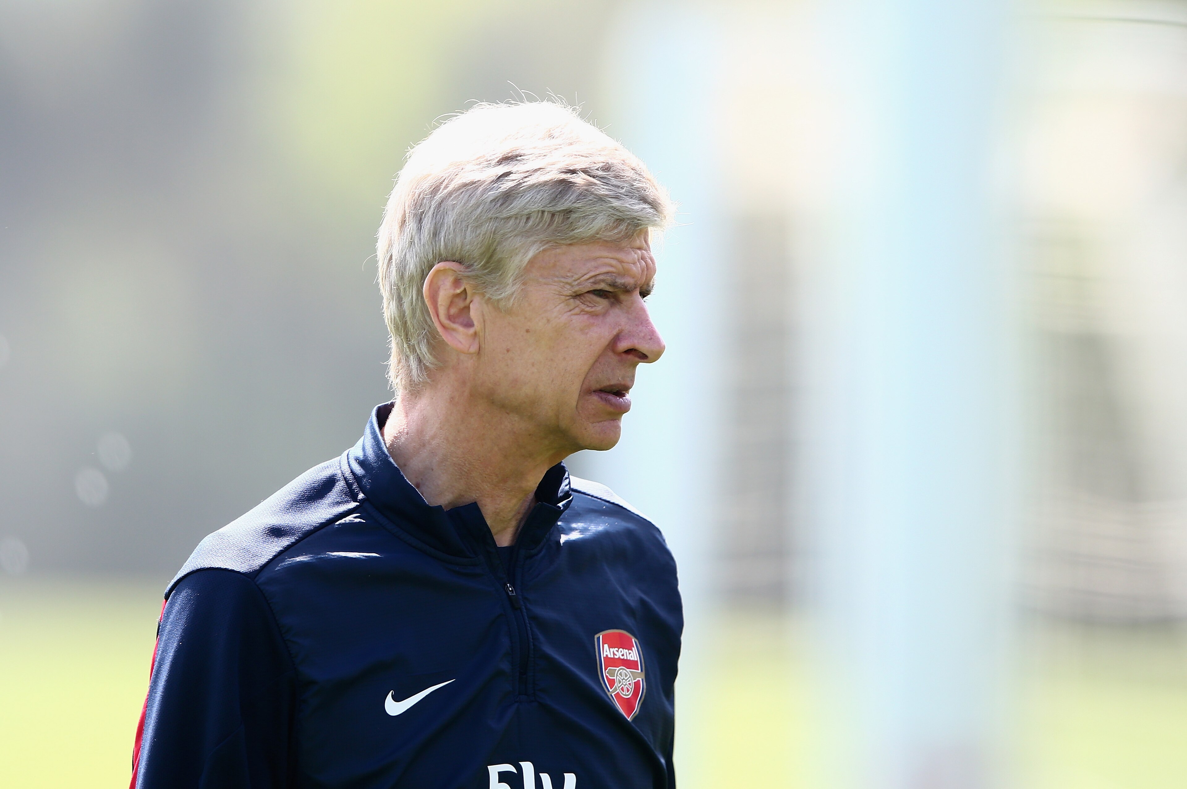 ST ALBANS, ENGLAND - MAY 14:  Arsene Wenger of Arsenal looks on during a training session ahead of the FA Cup Final match between Arsenal and Hull City at London Colney on May 14, 2014 in St Albans, England.  (Photo by Clive Mason/Getty Images)