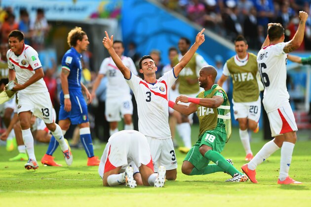 RECIFE, BRAZIL - JUNE 20: Giancarlo Gonzalez of Costa Rica celebrates with teammates after defeating Costa Rica 1-0 during the 2014 FIFA World Cup Brazil Group D match between Italy and Costa Rica at Arena Pernambuco on June 20, 2014 in Recife, Brazil.  (Photo by Laurence Griffiths/Getty Images)