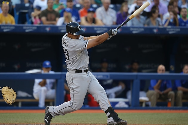 TORONTO, CANADA - JUNE 27: Jose Abreu #79 of the Chicago White Sox hits a solo home run in the fifth inning during MLB game action against the Toronto Blue Jays on June 27, 2014 at Rogers Centre in Toronto, Ontario, Canada. (Photo by Tom Szczerbowski/Getty Images)