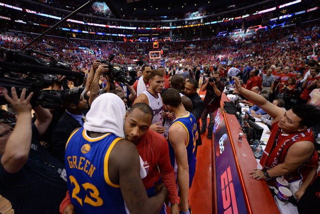 LOS ANGELES, CA - MAY 3: The Los Angeles Clippers and The Golden State Warriors players greet each other following Game Seven of the Western Conference Quarterfinals during the 2014 NBA Playoffs at Staples Center on May 3, 2014 in Los Angeles, California. NOTE TO USER: User expressly acknowledges and agrees that, by downloading and/or using this Photograph, user is consenting to the terms and conditions of the Getty Images License Agreement. Mandatory Copyright Notice: Copyright 2014 NBAE (Photo by Noah Graham/NBAE via Getty Images)