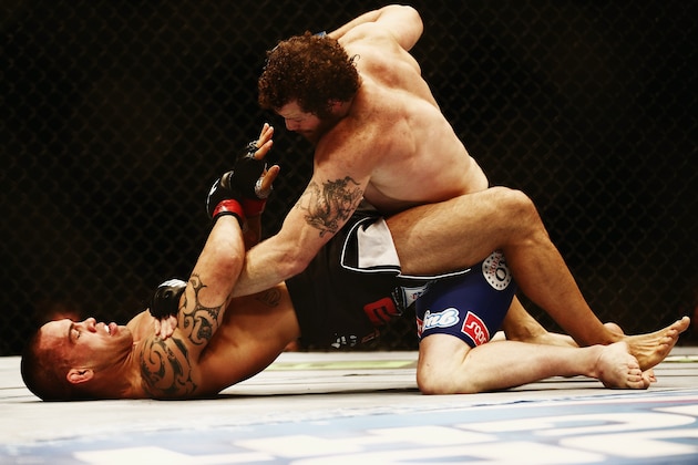 AUCKLAND, NEW ZEALAND - JUNE 28:  James Te Huna of New Zealand is held down by Nate Marquardt of USA during the UFC Middleweight bout between James Te Huna of New Zealand and Nate Marquardt of USA on June 28, 2014 in Auckland, New Zealand.  (Photo by Hannah Peters/Getty Images)