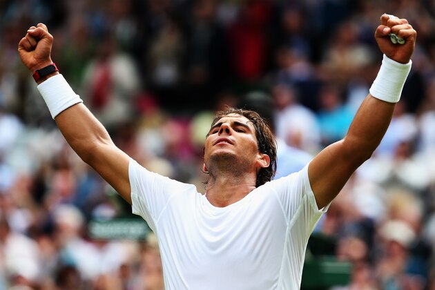 LONDON, ENGLAND - JUNE 26:  Rafael Nadal of Spain celebrates after winning his Gentlemen's Singles second round match against Lukas Rosol of Czech Republic on day four of the Wimbledon Lawn Tennis Championships at the All England Lawn Tennis and Croquet Club at Wimbledon on June 26, 2014 in London, England.  (Photo by Jan Kruger/Getty Images)