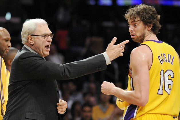 Los Angeles Lakers head coach Phil Jackson, left, gestures as Los Angeles Lakers forward Pau Gasol (16), of Spain, looks on during the first half of their NBA basketball game against the Orlando Magic, Friday, Jan. 16, 2009, in Los Angeles.  (AP Photo/Mark J. Terrill)