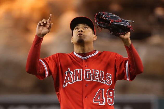 ANAHEIM, CA - JUNE 09: Pitcher Ernesto Frieri #49 of the Los Angeles Angels of Anaheim celebrates after getting the last out in the ninth inning against the Oakland Athletics during the MLB game at Angel Stadium of Anaheim on June 9, 2014 in Anaheim, California. The Angels defewated the Athletics 4-1. (Photo by Victor Decolongon/Getty Images) ANAHEIM, CA - JUNE 09: Pitcher Ernesto Frieri #49 of the Los Angeles Angels of Anaheim celebrates after getting the last out in the ninth inning against the Oakland Athletics during the MLB game at Angel Stadium of Anaheim on June 9, 2014 in Anaheim, California. The Angels defewated the Athletics 4-1. (Photo by Victor Decolongon/Getty Images)