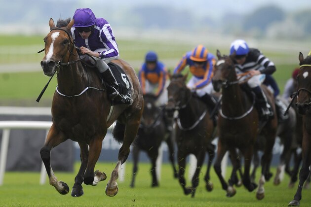 KILDARE, IRELAND - MAY 25:   Ryan Moore riding Marvellous win The Etihad Airways Irish 1,000 Guineas at Curragh racecourse on May 25, 2014 in Kildare, Ireland. (Photo by Alan Crowhurst/Getty Images)