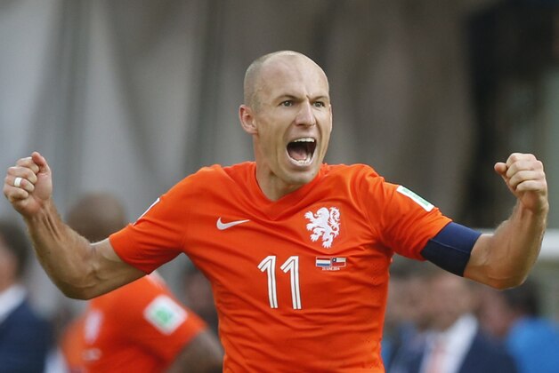 Netherlands' Arjen Robben shouts after his team scored for the 2-0 lead during the group B World Cup soccer match between the Netherlands and Chile at the Itaquerao Stadium in Sao Paulo, Brazil, Monday, June 23, 2014. The Dutch team beat Chile 2-0 to top Group B. (AP Photo/Wong Maye-E)