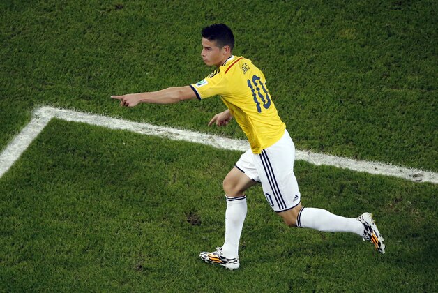 Colombia's James Rodriguez celebrates scoring his side's second goal during the World Cup round of 16 soccer match between Colombia and Uruguay at the Maracana Stadium in Rio de Janeiro, Brazil, Saturday, June 28, 2014. (AP Photo/Fabrizio Bensch, Pool)