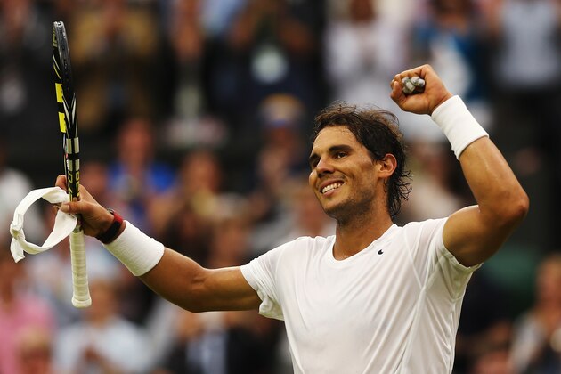 LONDON, ENGLAND - JUNE 28:  Rafael Nadal of Spain celebrates after winning his Gentlemen's Singles third round match against Mikhail Kukushkin of Kazakhstan on day six of the Wimbledon Lawn Tennis Championships at the All England Lawn Tennis and Croquet Club at Wimbledon on June 28, 2014 in London, England.  (Photo by Matthew Stockman/Getty Images)