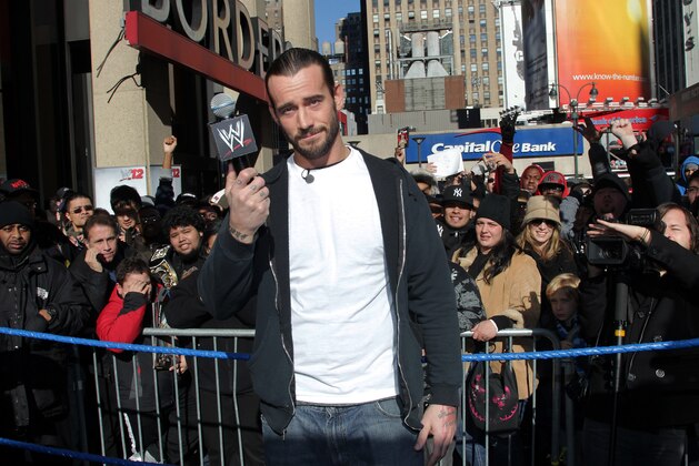 WWE Superstar CM Punk poses at Madison Square Garden, Friday, Nov. 18, 2011, in New York, during a rally leading up to the 25th Anniversary of Survivor Series, taking place Sunday at Madison Square Garden.  The event will feature actor and wrestling favorite Dwayne